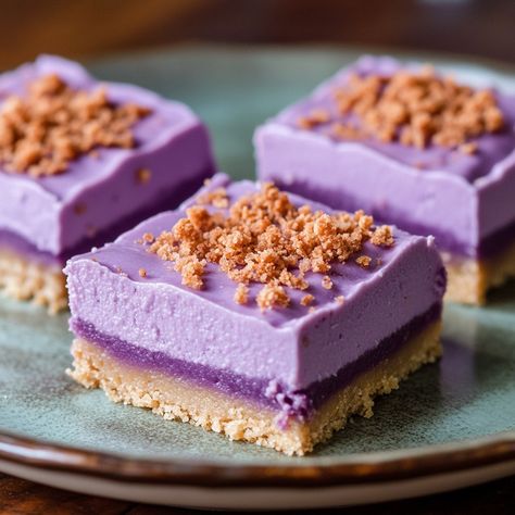 💜🍰 Treat yourself to our Creamy Ube Cheesecake Bars! A vibrant and luscious dessert! 🌈✨ #UbeLovers Creamy Ube Cheesecake Bars Ingredients: Graham cracker crumbs (1 cup) Butter, melted (1/4 cup) Cream cheese (2 cups) Sugar (1 cup) Ube halaya (1/2 cup) Eggs (2) Ube extract (1 tsp) Vanilla extract (1 tsp) Instructions: Preheat oven to 350°F (175°C). Mix graham cracker crumbs with melted butter and press into a baking pan. Beat cream cheese and sugar until smooth. Add ube halaya, ube extract,... Ube Extract, Ube Cheesecake, Ube Halaya, Instagram Recipes, Trending Recipes, Cheesecake Bars, Baking Pan, Graham Cracker Crumbs, Graham Cracker