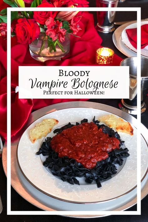 Squid ink pasta with bloody bolognese sauce - perfect for a vampire dinner or Halloween! Squid Ink Pasta Recipe Halloween, Vampire Food Ideas Dinner Parties, Halloween Squid Ink Pasta, Black Pasta Recipe Halloween, Vampire Theme Dinner Party, Twilight Dinner Ideas, Vampire Themed Food Dinner Parties, Squid Ink Pasta Halloween, Halloween Themed Italian Food