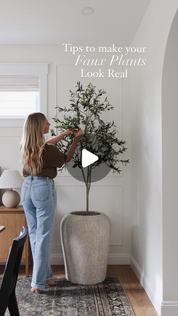 Amy E Peters | Home Decor on Instagram: "HOW TO MAKE YOUR FAUX PLANTS LOOK REAL 🌿  This gorgeous 70” faux olive tree is from @decorsveronneau - and we are Giving away $150 e-giftcard to their online shop.  To enter: 🌿Follow both @amyepeters and @decorsveronneau  🌿Like this Reel and tag some plant loving friends! BONUS 5 entries- share this reel in your stories, make sure you tag me so I can see it!  Giveaway will run until February 16th and is open to Canadian residents. This giveaway is in no way sponsored or endorsed by Instagram. GOOD LUCK!  Use these simple pointers to help elevate your faux plants!  - Use a larger pot. Preferably a wider or taller pot that you love and that suits your style. - Add a tall bucket or vase inside your pot to raise your plant (Now my 70” tree just got t Tall Vase Decorating Ideas, End Of Hallway, Door Tree, Old Packaging, Tree Planters, Indoor Tree, Get Taller, Faux Olive Tree, Old Towels