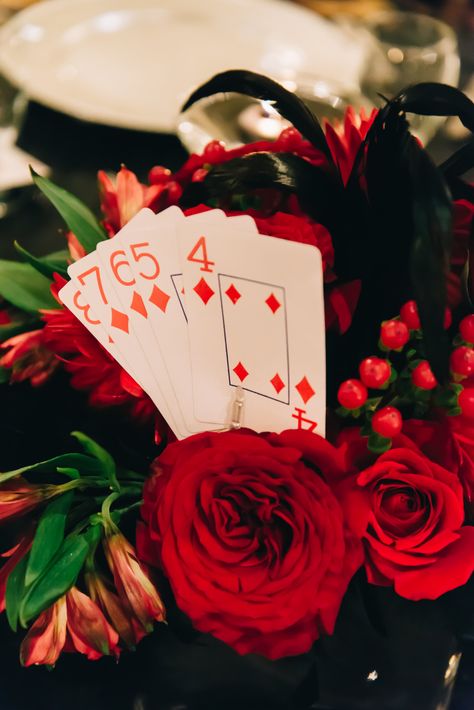 Red roses make a lovely and stunning centerpiece for a formal event. Casino Night James D'arcy, Casino Table, Casino Royale Party, Casino Chips, Casino Night, Casino Royale, Casino Theme Parties, Casino Theme, Theme Party Decorations