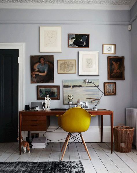 mid-century modern home office, contrasted with deep baseboards, painted wood floors, & ceiling details, all in neutrals, gallery wall Mid Century Modern Home Office, London Houses, Yellow Chair, Decor Studio, Deco Retro, Workspace Inspiration, Modern Home Office, Diy Desk, Style At Home