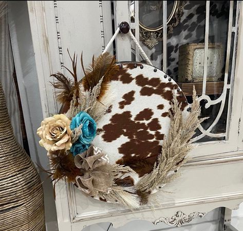 Cow Print Welcome Sign Round, Cowgirl Wedding Decorations, Cowhide Door Hanger, Cow Hide Crafts, Western Door Hangers, Cowhide Wall Decor, Cowhide On Wall Ideas, Cowhide Ideas, Cowhide Crafts