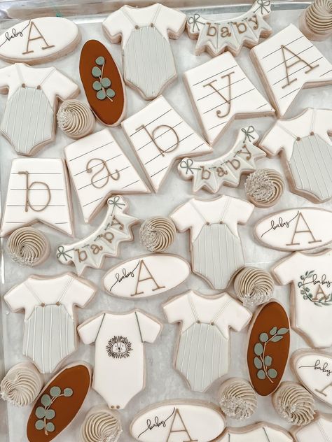 Decorated cookies in a minimalistic way for a baby shower.  Banner cookies, onesie cookies, eucalyptus decorated cookie. Kentucky Cookies, Baby Shower Decorated Cookies, Baby Boy Banner, Baby Boy Cookies, Onesie Cookies, Cookie Decorating Party, Its A Boy Banner, Baby Banners, Baby Cookies