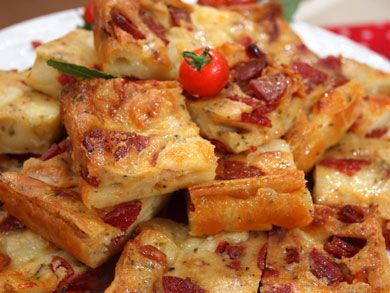 Pepperoni Pie Squares      *1 1/2 cups all-purpose flour *2 cups milk *2 eggs, lightly beaten *1 lb Muenster cheese, cubed *1 (8-oz) pkg sliced pepperoni, chopped *1 tsp dried Italian seasoning  *Preheat to 350F. Coat a 9-x13" baking dish with Pam.      *In large bowl, combine all ingredients; mix well, pour in baking dish. *Bake 25=30 mins, or til top is golden; cool slightly cut in squares. *Notes   Serve w/pizza sauce.  Substitutes: sausage, onions, mushrooms, gr pepper, hot pepper cheese. Pepperoni Appetizers, Pie Squares, Pepperoni Recipes, Muenster Cheese, Quick Food, Square Recipes, Amazing Appetizers, Tasty Kitchen, Party Recipes