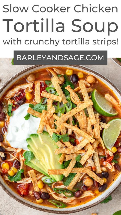 This simple slow cooker chicken tortilla soup is the ultimate easy weeknight meal! It's full of shredded chicken, beans, and corn; then topped with homemade tortilla strips, sliced avocado, and green onions. It's cozy, comforting, and super easy to make! Lean And Green Chicken Tortilla Soup, Clean Food Crush Chicken Tortilla Soup, Tortilla Chicken Soup Crockpot, Simple Slow Cooker Chicken, Slow Cooker Chicken Tortilla Soup Recipe, Homemade Tortilla Strips, Chicken Soup Crockpot, Chicken Tortilla Soup Crock Pot, Amazing Slow Cooker Recipes