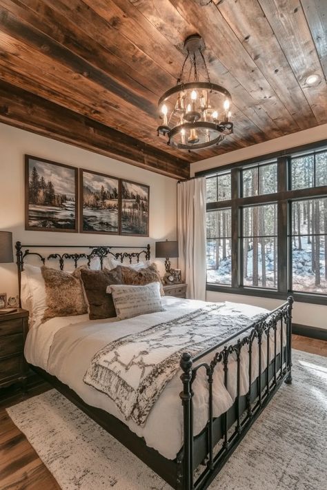 Rustic-chic bedroom. Shiplap ceiling with a distressed black iron frame bed.  Welcome to the latest trend in home design that combines both style and functionality seamlessly - modern farmhouse sleeping spaces with sliding barn doors! This rustic-chic decor has taken the interior design world by storm, promising a unique blend of snug comfort and stylized appeal. You definitely won't be disappointed!…  Read more: https://tastyinteriors.com/generated-post-73-modern-farmhouse-sleeping-spaces-sliding-barn-doors/ Bedroom Ideas Barndominium, Rustic Guest Room Ideas, Barndo Bedroom Ideas, Barndominium Ideas Interiors Bedroom, Barn House Bedroom Ideas, Dream Farmhouse Bedroom, Country Master Bed, Barndominium Bedroom Ideas, Country Rustic Bedroom Ideas