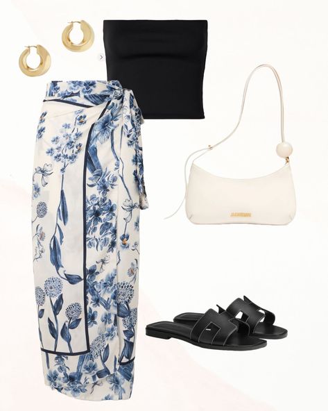 FLORAL SKIRT (beach cover-up) & BLACK TUBE TOP✨Featuring a trendy black tube top paired with a flowy floral wrap skirt, this look is perfect for sunny days. Complemented with stylish black slides, gold hoop earrings, and a sophisticated white shoulder bag, this ensemble balances elegance and comfort. Ideal for a beach day, brunch, or a casual day out, this summer outfit is a must-have for your wardrobe. Save this pin for your next fashion inspiration! #summeroutfit #summerstyle #fashion #styl... Chic Capsule Wardrobe, Floral Wrap Skirt, Skirt Beach, Black Tube Top, White Shoulder Bag, Black Tube, Black Slides, Next Fashion, Instagram Outfits