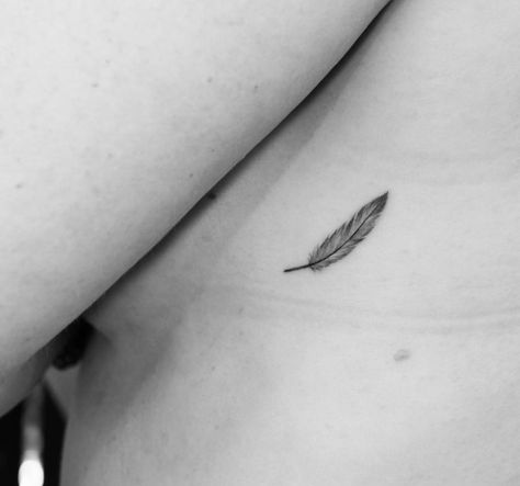 Tiny feather tattoo Tiny Feather Tattoo, 200 Tattoo, Feather Arrow Tattoo, Trap Tattoos For Women, Small Feather Tattoo, Tattoo Arrow, Tiny Bird Tattoos, Ear Tattoo Ideas, Finger Tattoo For Women