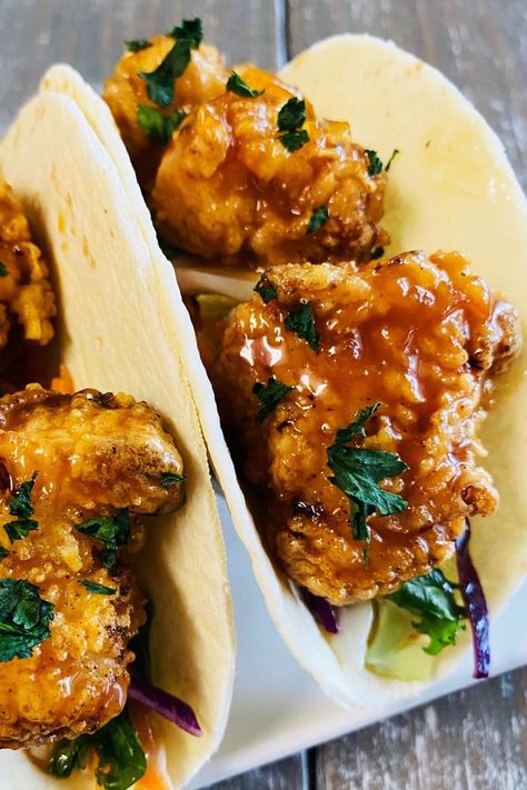 tacos with crispy orange chicken bites Recipe For Fried Chicken, Fried Chicken Bites, Crispy Orange Chicken, Tacos With Slaw, Fried Chicken Taco, Slow Cooker Chicken Tacos, Tacos And Burritos, Orange Sauce, Half Baked