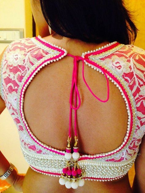 Hot pink lining with white lace blouse for saree with big round winder back neck design Lace Blouse Design, Choli Blouse, Blouse Back Neck Designs, Sari Blouse Designs, Back Neck Designs, Blouse Designs Indian, Saree Blouse Patterns, Choli Designs, Salwar Kamiz