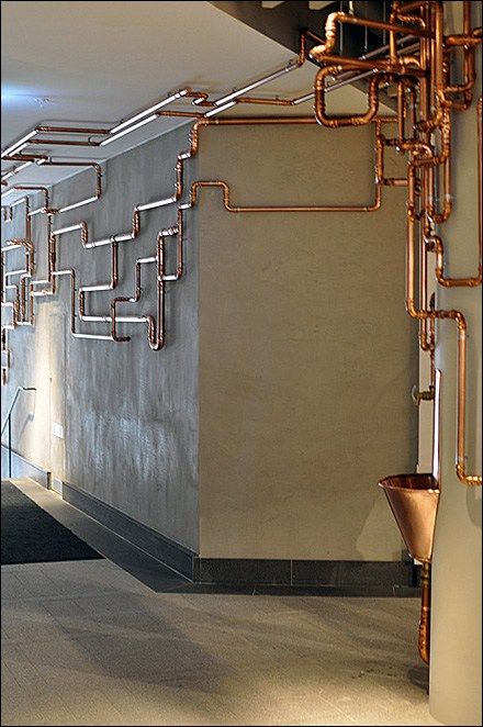 As customer amenity this Copper Water Fountain would catch the eye, even without the runaway copper piping. I’m sure the… Copper Pipe Art, Industrial Hallway, Luminaria Diy, Modern Industrial Interior, Copper Pipes, Industrial Bedroom, Industrial Design Furniture, Vintage Industrial Style, Industrial Interior Design