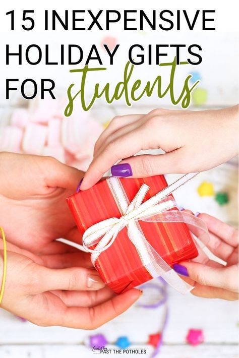 Image of two sets of hands giving and receiving a small gift in a red box with a white ribbon tied in a bow.  The title of the graphic is "15 Inexpensive Holiday Gifts for Students". Teacher Gifts To Preschool Students, Cheap Student Gifts Christmas, Non Food Prizes For Students, Xmas Gift Ideas For Students, Thank You Gift For Students, Christmas Gifts For Teachers To Give Students, Cute Gifts For Students From Teacher, Fccla Gifts, Christmas Present Ideas For Students