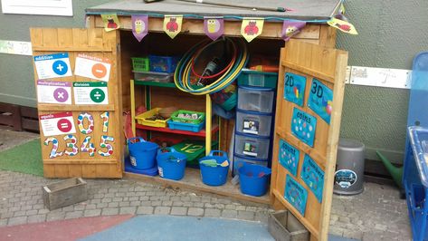 Outdoor maths shed Eyfs Outdoor Storage Ideas, Outdoor Role Play Area, Outdoor Eyfs, Outdoor Maths, Reception Maths, Outdoor Kindergarten, Eyfs Outdoor, Eyfs Outdoor Area, Reception Classroom