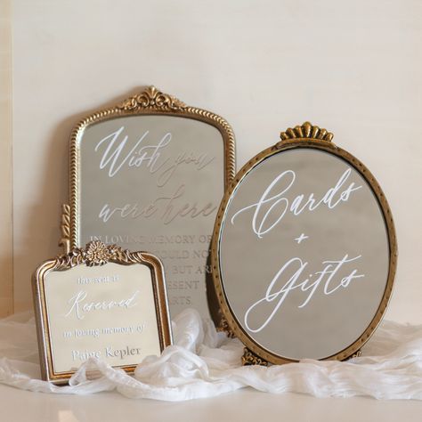 The Wedding Miniatures 🤍🪞 . . Featuring "Wish You Were Here," "Cards + Gifts," and the "Reserved Seat" from our wedding details collection! . . . #wedding #weddinginspo #weddingideas #weddingdecor #weddingsign #weddingsigns #weddingsignage #weddingsignages #weddingsignideas #weddingdetails #weddingdetailshots #weddingdecoration #weddingdecorideas #weddingstyle #weddingstyles #weddingmirror #weddingmirrors #weddingmirrorsign #etsy #Etsyshop #etsyshop #etsyfinds #etsygifts #etsystore #etsysell... Wedding Welcome Mirror, Mirror Signage, Minimalist Entrance, Victorian Wedding Themes, Mirror Wedding Signs, Bride Era, Entrance Signs, Custom Welcome Sign, Wedding Doves