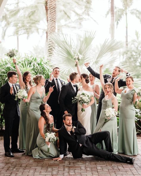 A vibrant, stylish bridal party bringing effortless energy and elegance—celebrating the newlyweds with a perfect mix of fun and sophistication. Loved the girls sage green dresses. Soooo complimentary to this venue and overall classic wedding theme. 🤍 What Color Suit Goes With Green Dress, Sage Wedding Party Attire, Wedding Party Colors Green, Sage Green Wedding Colors Groomsmen, Sage Green And Gold Wedding Groomsmen, Sage Green And Black Tux Wedding, Groomsmen With Sage Green Bridesmaids, Green Black And Champagne Wedding, Sage Green Black And White Wedding Theme