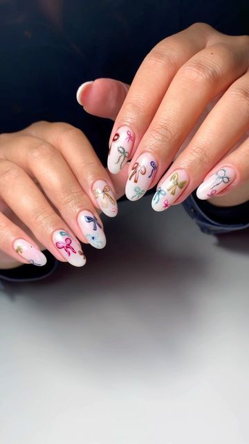 Hayley•Private Nail Artist on Instagram: "Bows on bows on bows 🫠 • Before work is not mine, but we had a damn good time fixing this girl up with the cutest Birthday/Christmas nails everrrr! Inspired by: @nails_by.ry 💕 • • • #nails #nailinspo #bownails #nailart #nailartist #slcnails #slcnailtech #utahnailtech #holidaynails #christmasnails" Cutest Christmas Nails, Champagne Bottle Nail Art, Summer Bow Nails, Cute Christmas Nails With Bows, Christmas Summer Nails, Christmas Bow Nails Design, How To Draw A Bow On Nails, Confetti Nail Art, Nails For New York