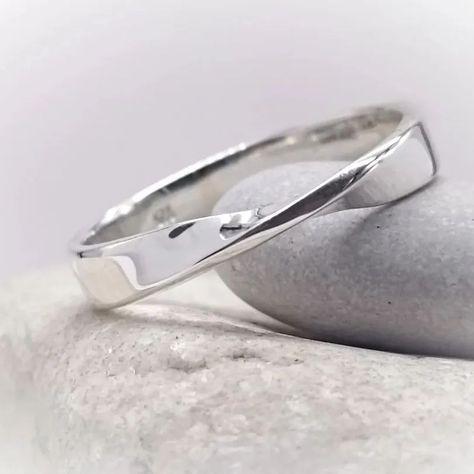 The Mobius Strip Ring When I was in school, some of the geometry (and not only, to be honest) passed me by)) The more interesting it is to learn such figures empirically! The ring is made of 585 * white gold, but for the test I had to first make the same in silver in order to understand all the nuances and difficulties in working on this order and only then deal with the ring in gold. 🔹Mobius Ribbon ring in white gold 14K (585*) 🔹Made to order in our workshop 🔹Size 51.5 (diameter 16.5 mm)... Mobius Strip Ring, Mobius Strip, Ribbon Ring, Geometry, More Fun, White Gold, Silver, Gold