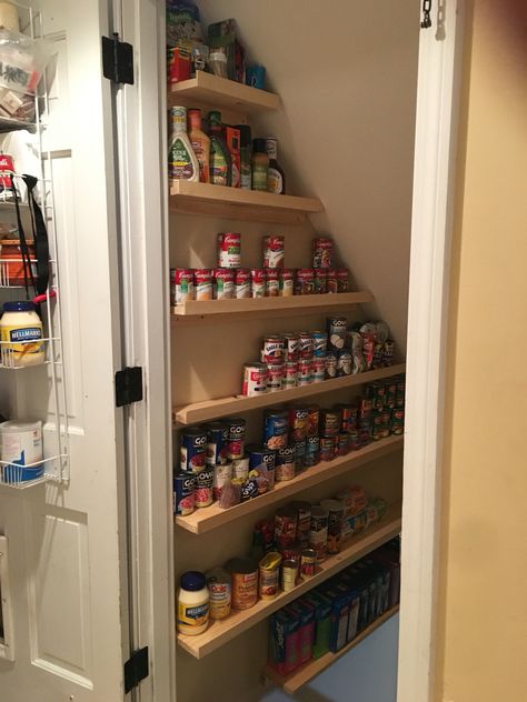 Finally made my "storage pantry" heading down basement stairs. May 2016 Pantry Room Under Stairs, Basement Stairs Pantry Ideas, Under Stairway Pantry, Basement Stair Pantry, Basement Stair Storage, Basement Stairwell Storage, Stairway Pantry, Basement Stairs Storage, Stairwell Pantry