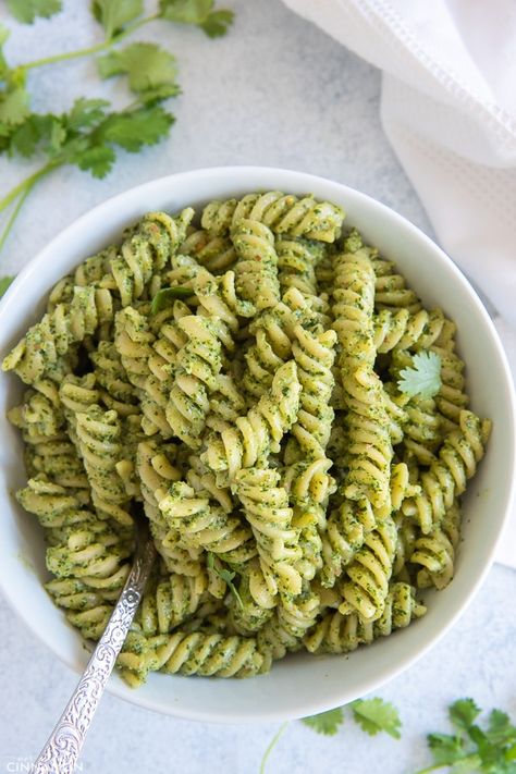 Creamy Cilantro Pasta is a South of the Border inspired spin on classic pesto pasta. All rounded of with a touch of cream, some lime and garlic! The perfect office lunch or easy vegetarian pasta dinner.  #pasta #vegetarian #lunch Cilantro Pasta, Lemon Pesto Pasta, Nut Free Pesto, Vegan Pesto Pasta, Alfredo Lasagna, Lemon Pesto, Cilantro Pesto, Pasta Easy, Pesto Pasta Recipes