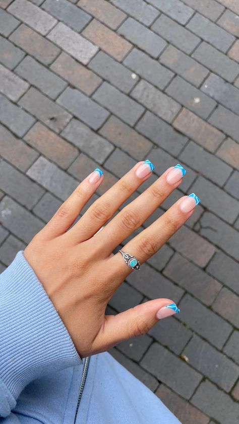 A picture of a hand with acrylic nails set. Tips are medium blue with light blue wavy lines. Body of nail is a shiny flesh colour Ocean French Tip Nails, Nail Inspo For Summer, Wavy Design, Short Acrylic, Tip Nails, Short Acrylic Nails Designs, French Tip Nails, Short Acrylic Nails, Nails Designs