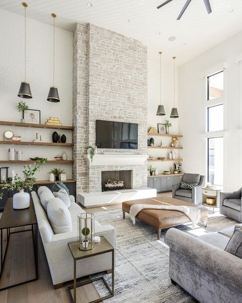 Home Decor And Interior Design on Instagram: "So many different views of this perfect Great Room. If the kitchen is the heart of the home, then this Great Room is the center of the home. - - Everything branched off this one space. This fireplace design has so many different details to notice. Take some time and notice the layers of texture between the precast material and the stone, with the sides done in a painted brick. Also, notice the levels of how these were layered on top of each other. T Fireplace With Cabinets, Modern Apartment Design, Fireplace Shelves, Family Room Makeover, Open Plan Kitchen Living Room, Fireplace Built Ins, Southern Home, Design Your Home, Living Room With Fireplace