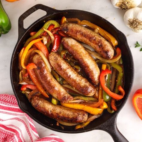 Sausage And Peppers Recipe, Sausage Peppers And Onions, Braised Chicken Thighs, Iron Skillet Recipes, Cast Iron Skillet Recipes, Hot Italian Sausage, Sausage And Peppers, Braised Chicken, How To Cook Sausage