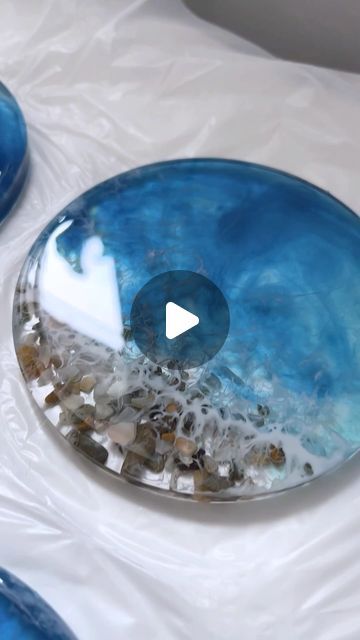 Craft Resin Epoxy - The Clear Choice for Artists & Crafters on Instagram: "🌊✨ DIY Ocean-Inspired Resin Coasters Tutorial! 

In this video, our talented artisan @anastasia_kate_art takes you through a step-by-step tutorial on creating stunning ocean-themed coasters using 1:1 @craft.resin 

🔹 Step 1: She starts by mixing the resin in equal parts. 
🔹 Step 2: Next, she pours the resin into the mold and adds decorative elements like small stones for that perfect beachy vibe. 
🔹 Step 3: A touch of white pigment is added to create beautiful wave effects.

Watch till the end to see the breathtaking final result! 🌟 

Use code ANASTASIA10 to get 10% off at craft-resin.com 

Don’t forget to like and share if you love these coasters as much as we do! 💙

 #ResinArt #DIYCoasters #CraftResin #Ocean Small Epoxy Projects, Diy Resin Coasters, Ocean Resin Art, Beach Coasters, Craft Resin, Ice Resin, Pink Ocean, Resin Coasters, Diy Coasters