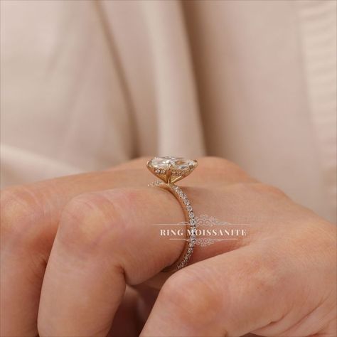 Unique 2.6 carat marquise moissanite engagement ring.

- Style : solitaire / pave band / hidden halo
- 2.6 carat center
- 12*6mm marquise cut, colorless moissanite in 14k yellow gold

For more details comment below. Engagement Ring Pave Band, Gold Marquise Engagement Ring, Marquise Engagement Ring Gold, Marquise Moissanite Engagement Ring, Engagement Ring Pave, Pave Band Engagement Ring, Marquise Engagement Ring, Halo 2, Engagement Rings Marquise