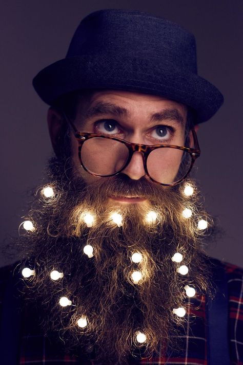 Forget beard baubles and glitter beards, hipsters are now opting for twinkling fairy lights as the latest way to add an extra festive touch to chin fuzz in 2016’s hottest Christmas trend. East Village E20, London is providing a beard pimping service to gentlemen wanting to adorn themselves with the yuletide facial hair accessory. Taking place at their Christmas Makers Market on Sunday 11th December, the stand will allow every hirsute gentleman the chance to get in on the trend – and provide s... Beard Baubles, Crazy Beard, Beard Decorations, Beard Ornaments, Glitter Beards, Beard Designs, Beard Tips, Beard Lover, Great Beards