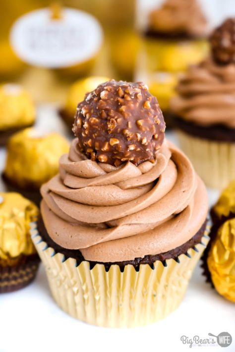 Ferrero Rocher Cupcakes - Love Ferrero Rocher Candies? Then these Ferrero Rocher Cupcakes are going to be your new favorite dessert! Homemade Chocolate cupcakes with a chocolate hazelnut frosting is topped with a Ferrero Rocher Chocolate and dressed in a gold cupcake liner for the most elegant cupcake ever. Fancy Chocolate Cupcakes, Ferrero Cupcakes, Cupcake Reference, Fancy Cupcakes Decorating, Hazelnut Frosting, Ferrero Rocher Cupcakes, Gourmet Cupcake, Homemade Chocolate Cupcakes, Ferrero Rocher Chocolate