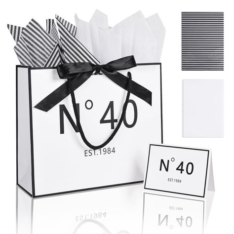 PRICES MAY VARY. 【SPACIOUS GIFT BAG】Our large sized 40th birthday gift bag measures 12.6" x 10.6" x 4.4", perfect for holding a variety of 40th birthday gifts. It includes a 40th birthday card and two sheets of tissue paper, all designed with durable heavy kraft paper. Our gift bags are both beautiful and functional, and are ideal for holding items such as books, jewelry, DVDs, puzzles, toys or clothing. 【PREMIUM QUALITY & ECO-FRIENDLY】Our 40th birthday bag is made of high quality thickened kraf 40th Birthday Gift Ideas, 40th Birthday Favors, 1984 Birthday, Party Favors For Adults, Birthday Bag, 40th Birthday Cards, Birthday Gift Bags, 40th Birthday Parties, 40th Birthday Gifts