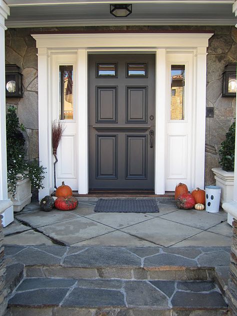 front door is Sherwin Williams Iron Ore. I like the black and white look Porch Door Ideas Entrance, Bungalow Facade, Sherwin Williams Iron Ore, Household Design, Houses Exterior, Classic Homes, Stone Steps, Black Front Doors, Door Paint Colors