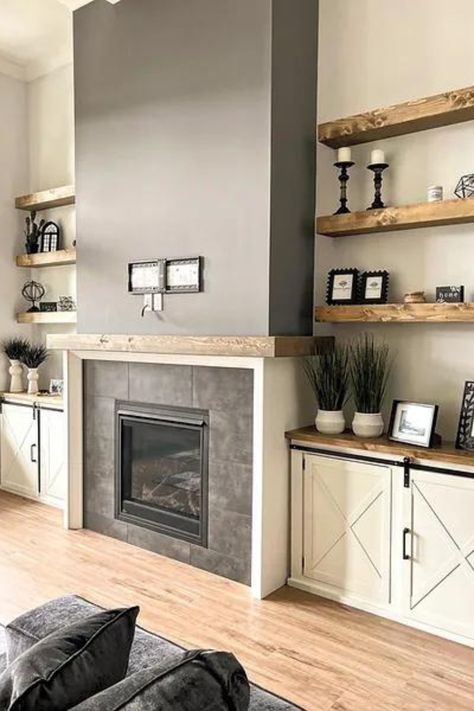 Loving the cozy yet modern vibes of these floating shelves next to the fireplace! 🔥 Perfect for displaying decor or adding extra storage without taking up precious floor space. Check out more tips on how to style your small living room on our blog! #smalllivingroomideas #floatingshelves #tinyhousedecor Living Room Floating Shelves Around Tv, Floating Shelves By Fireplace, Floating Shelves Next To Fireplace, Shelves Next To Fireplace, Fireplace Alcove Ideas, Shelves Around Fireplace, Grey Floating Shelves, Built In Around Fireplace, Sleek Fireplace