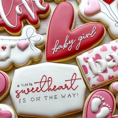 Emily’s Bake Shop on Instagram: "A little sweetheart is on the way! ❤️ the absolute cutest Valentine’s Day baby shower theme! I love the clothesline cookie and the “baby” plaque 🥰 • • #emilysbakeshop #customcookies #decoratedcookies #cookier #cookieart #njbaker #njcookies #sugarcookies #sugarcookiedecorating #sugarcookiemarketing #valentinesdaycookies #babyshowercookies #sweetheartcookies #valentinesdaybabyshower" February Baby Shower Themes, February Baby Showers, Sweet Baby Shower Ideas, Cat Baby Shower, Peanut Baby Shower, February Baby, Valentines Baby Shower, Winter Shower, Cookies Theme