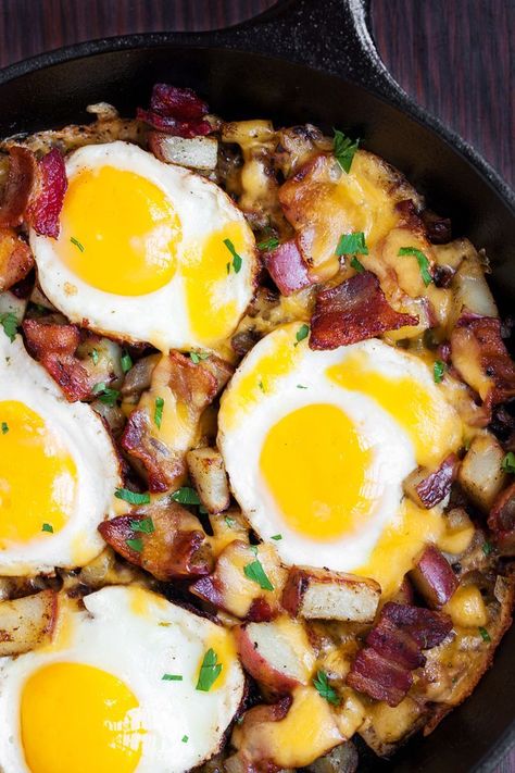 This country breakfast skillet not only has thick-cut bacon, but also tender potatoes and flavorful peppers. Not to mention, the four sunny side up eggs because no breakfast is complete without eggs. Not to mention, the four sunny side up eggs because no Country Breakfast Skillet, Sunny Side Up Eggs, Breakfast Skillet Recipes, Man Recipes, Country Breakfast, Grill Outdoor, Breakfast Skillet, Skillet Recipes, Fried Eggs