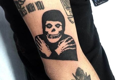 30+ Exclusive Misfits Tattoo Designs with Meanings and Ideas 3 Misfits Skull Tattoo, Punk Tattoo Ideas, Ogham Tattoo, Black Flag Tattoo, Misfits Tattoo, Punk Tattoo, Turtle Tattoo Designs, Tattoo Designs And Meanings, Cross Tattoo