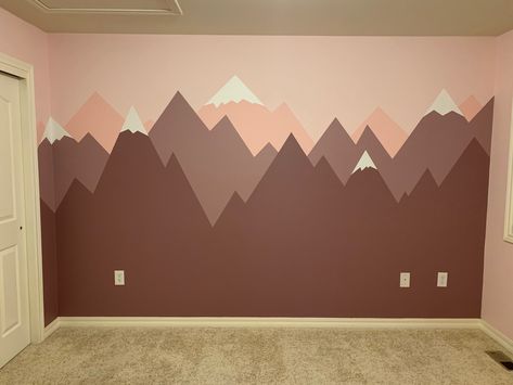 #Pink #Purple #Baby #Girl #Nursery #Outdoors #Mountains #Adventure Mountains Nursery Theme, Mountain Nursery Girl, Girly Nursery Ideas Woodland, Girl Mountain Nursery, Baby Girl Mountain Nursery, Adventure Nursery Girl, Painted Mountains On Wall Nursery, Girly Mountain Nursery, Nursery Accent Wall Mountains