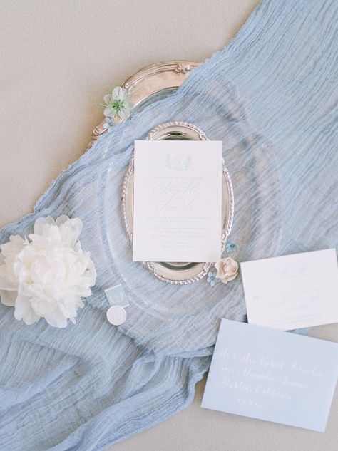 Wedding invitation with french blue embossed lettering on a silver tray. The tray is laying on blue fabric and surrounded by flowers. Photographed by Cassi Claire Photography at the Bourne Mansion in Oakdale, NY. #cassiclaireweddings #wedding #weddingceremony #newyorkweddings #newyorkweddingphotographer #bournemansionweddings #elegantweddings Bourne Mansion, French Blue Wedding, Baby Blue Aesthetic, Light Blue Aesthetic, Blue Inspiration, Long Island Wedding, Beautiful Stationery, New Jersey Wedding, Justin Alexander