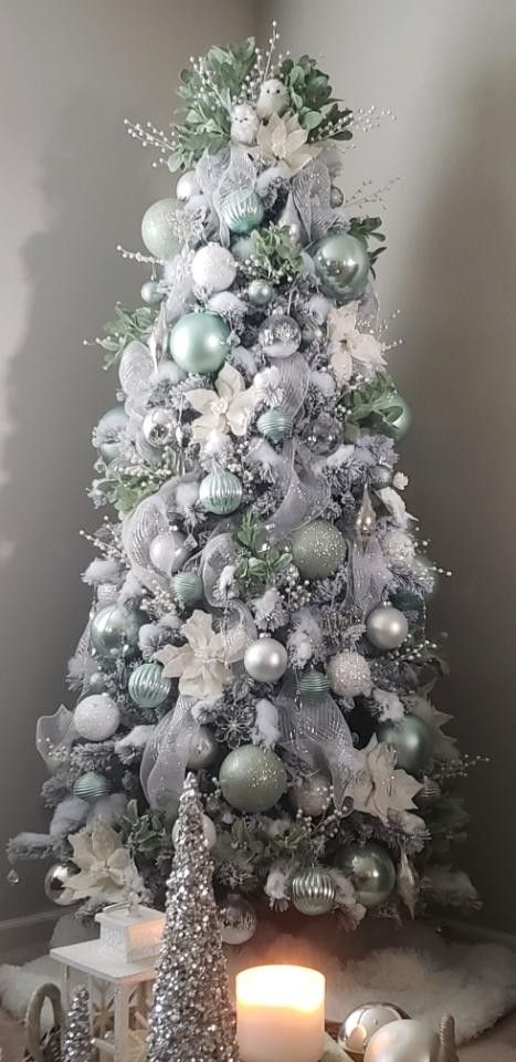 Beautiful icy mint tree! Silver Glitter Christmas Tree, Mint And Silver Christmas Tree, Mint Green Ornaments Christmas Tree, Mint Green Tree Decorations, Frost Tree Decorations, Silver White Green Christmas Tree, White Christmas Tree With Green Ornaments, Christmas Tree Silver And Green, Seafoam Green Christmas Tree