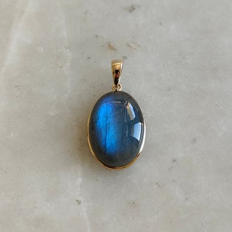 This stunning Pendant is set in 14k Solid Yellow Gold with Natural Labradorite with utmost precision. It is a unique gemstone Pendant for nearly every occasion and is completely hassle-free jewelry. ITEM DETAILS: * GEM: Labradorite * GEM SIZE: 13X18mm * GEM SHAPE: Oval * Gem weight: 13.98 carats * Gold Purity: 14KT (58.33% approx.) * Gold Weight: 0.59 gram big loop * Total Weight of the Pendant: 3.39 gram The Gold purity is guaranteed and it comes with authentic 14KT gold hallmark. Since my item Pendant Jewelry Gold, Energy Drain, Psychic Attacks, Handmade Jewelry Box, August Birthstone, Dope Jewelry, Labradorite Jewelry, Bezel Pendant, Yellow Gold Pendants