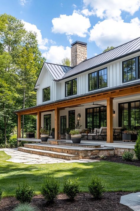 Modern farmhouse with wooden porch and stone steps. Modern country farmhouses mix rustic charm with sleek style, making city folks rethink skyscrapers for tractor beams. Farmhouse Exterior Renovation, Modern Farmhouse Homes, Ranch Farm House, Country Farmhouse Exterior, Rustic Lifestyle, Farmhouse Exteriors, Brick Steps, Country Modern Home, White Siding