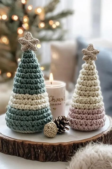 Two Christmas Crochet Trees for Decorations for a Cozy X-MAS. A snug Christmas Table centerpiece comprising of Crochet Christmas Tree on a wooden circular base, with pine and white chunky candle. A Hygge Way of Life - perfect for slowing down on winter days! Winter Decor Crochet Patterns Free, Crochet Hygge, Winter Crochet Decor, Crochet Winter Decoration, Crochet Winter Decor, Crochet Hygge Pattern, Red Heart Hygge Yarn Crochet Patterns, Hygge Christmas Decor, Christmas Hygge