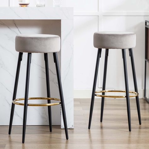 Minimalist design with clean lines, this round contemporary bar stool easily matches any other type of interior decor. Black metal legs match the golden footrest, with novel colour blending. Try adding these lovely bar stools to your kitchen, or restaurant to enjoy quick weekday breakfasts and delicious Sunday brunches. Seat Colour: Grey Small Breakfast Bar, Contemporary Bar Stool, Colour Blending, Breakfast Bar Stools, Contemporary Bar Stools, Contemporary Bar, Blue Elephant, Metal Bar Stools, Modern Bar Stools