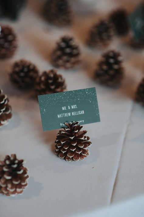 13 Easy Winter Wedding DIY Projects | OneFabDay.com Ornament Place Card Holder, Pine Cone Place Card Holder, Christmas Table Name Cards, Christmas Name Place Cards, Christmas Wedding Ideas, Ornament Wedding Favors, Leaf Confetti, Winter Wreath Diy, Place Card Holder