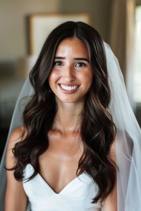 Explore 70+ bridal hair down inspirations for every season. These hairstyles are perfect for brides wanting to wear their hair down on their wedding day. From romantic curls to sleek straight hair, find the perfect bridal hair down look for any season. Bridesmaid Hair For Beach Wedding, Bridal Hair Medium Length Waves, Hair Curled Down Wedding, Simple Wave Hairstyles, Bride Hairstyles Down Middle Part, Wedding Dress Hairstyles, Bride Hair Curls, Classic Elegant Wedding Hair, Bridal Hair Wavy Down Loose Waves