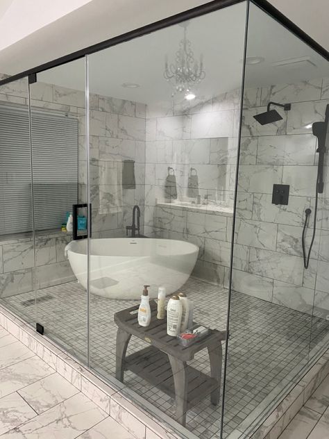 Gorgeous quartz bathtub inside a marble tiled shower enclosure. Bathroom For Couples Master Bath, Shower Types Master Bath, Big Bathtub For Two Master Bath, Combined Shower Tub Area, Euro Shower Master Bath, Bathrooms With Big Tubs, Huge Tub Master Bath, Dream Master Shower Luxury, Basement Master Suite Bathroom