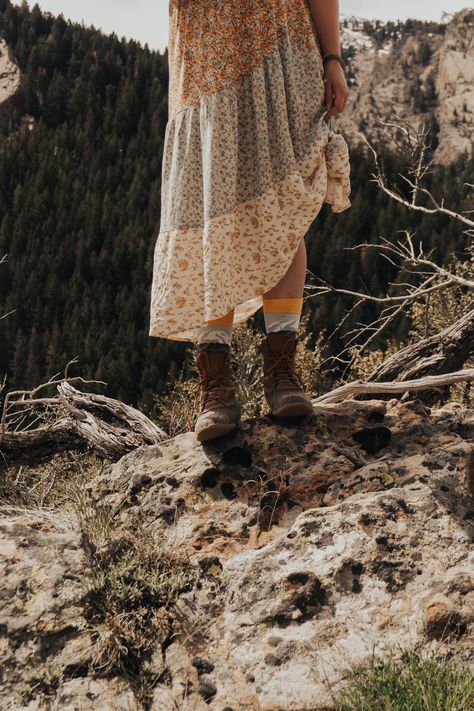 Floral maxi skirt with hiking boots. Hiking photography. Adventure outfits women. Hiking Boots And Dress Outfit, Hiking Boot With Skirt, Skirt Hiking Outfit, Hiking Boots Dress Outfit, Hiking Boots With Skirt, Camping Skirt Outfits, Hiking Boots With Dress, Girly Hiking Outfit, Feminine Hiking Outfit