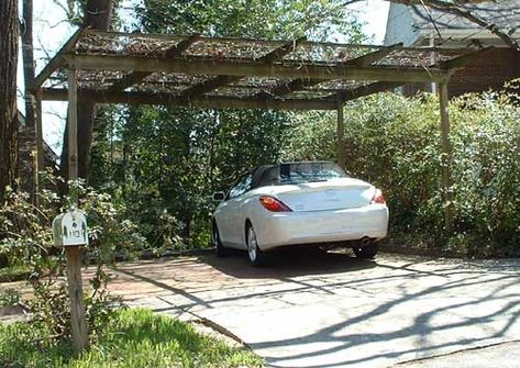 Pergola attached to front of garage means extra covered parking. Add wonderful smelling plants.... Trellis Carport, Covered Parking Ideas, Driveway Pergola Carport Ideas, Parking Pergola Car Ports, Carport With Covered Walkway, Parking Pergola, Carport With Vines, Car Pergola, Unique Trellis