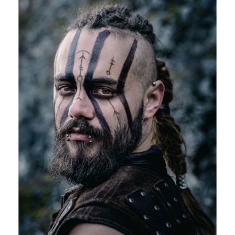 100+ Unique Viking Hairstyles For Your Inner Warrior | Man Haircuts Nordic Makeup Viking Man, Viking Face Tattoos For Men, Viking Warrior Makeup Men, Warrior Makeup Men, Viking Face Paint Men Warriors, Viking Face Paint Men, Mens Viking Makeup, Viking Paint, Viking Makeup Men