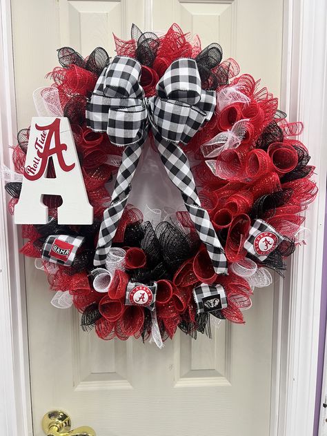 Celebrate your Alabama Crimson Tide pride with a beautifully crafted Alabama football wreath! This stunning piece features a bold crimson and white color scheme, accented with football-themed embellishments, Perfect for displaying on your front door or in your game room, this wreath embodies the spirit and passion of Alabama football, making it a must-have for any die-hard fan. Whether it's game day or just to show your school spirit year-round, this Alabama football wreath is sure to be a winni Alabama Football Wreath, Alabama Decor, Alabama Wreaths, Football Wreath, Alabama Football, Lanterns Decor, Alabama Crimson, Alabama Crimson Tide, Crimson Tide